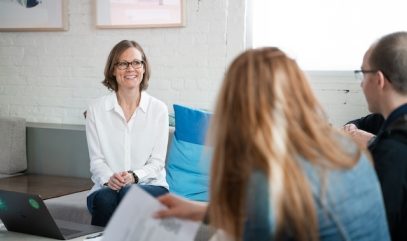 Kara talking with a group at Measure Meant's B Learning Hour