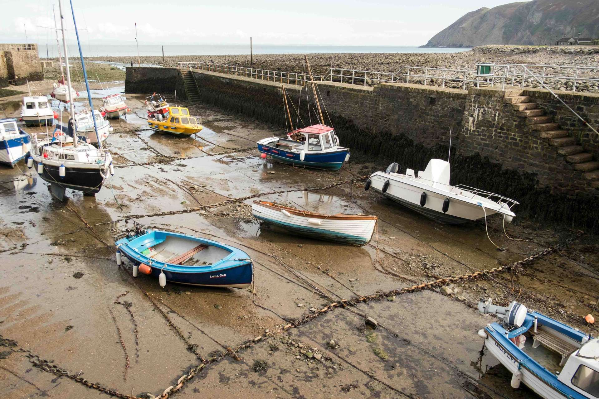 Boats stranded on the beach.